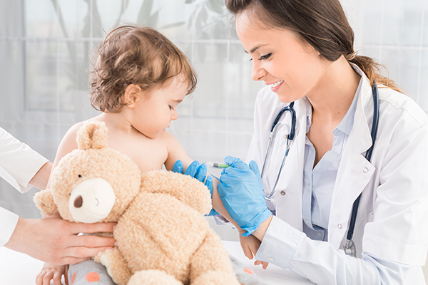 Image of a child receiving an immunisation